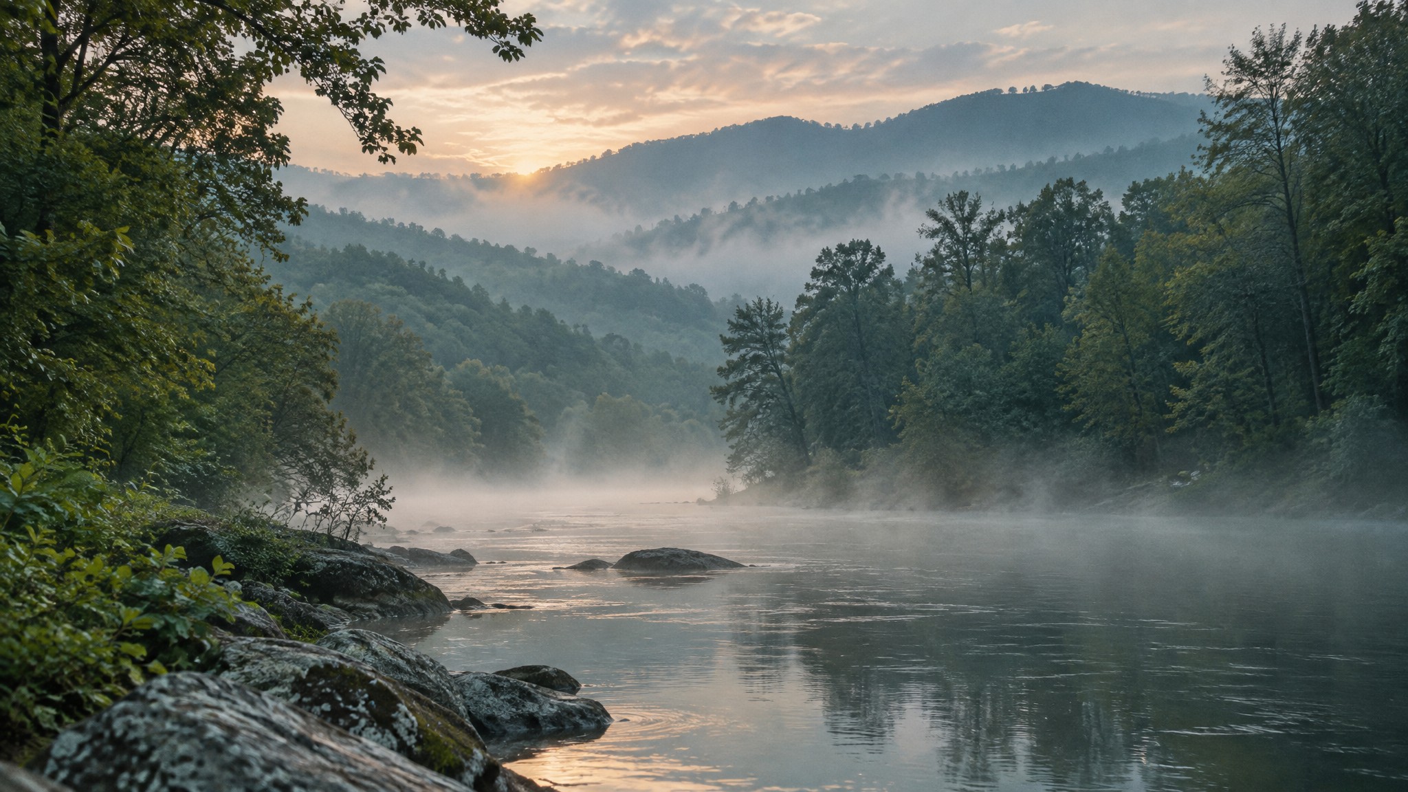 A misty forest river at dawn